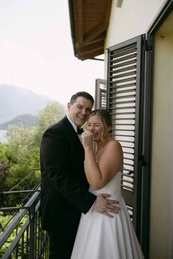 Bride and groom laughing during their Lake Como elopement portraits