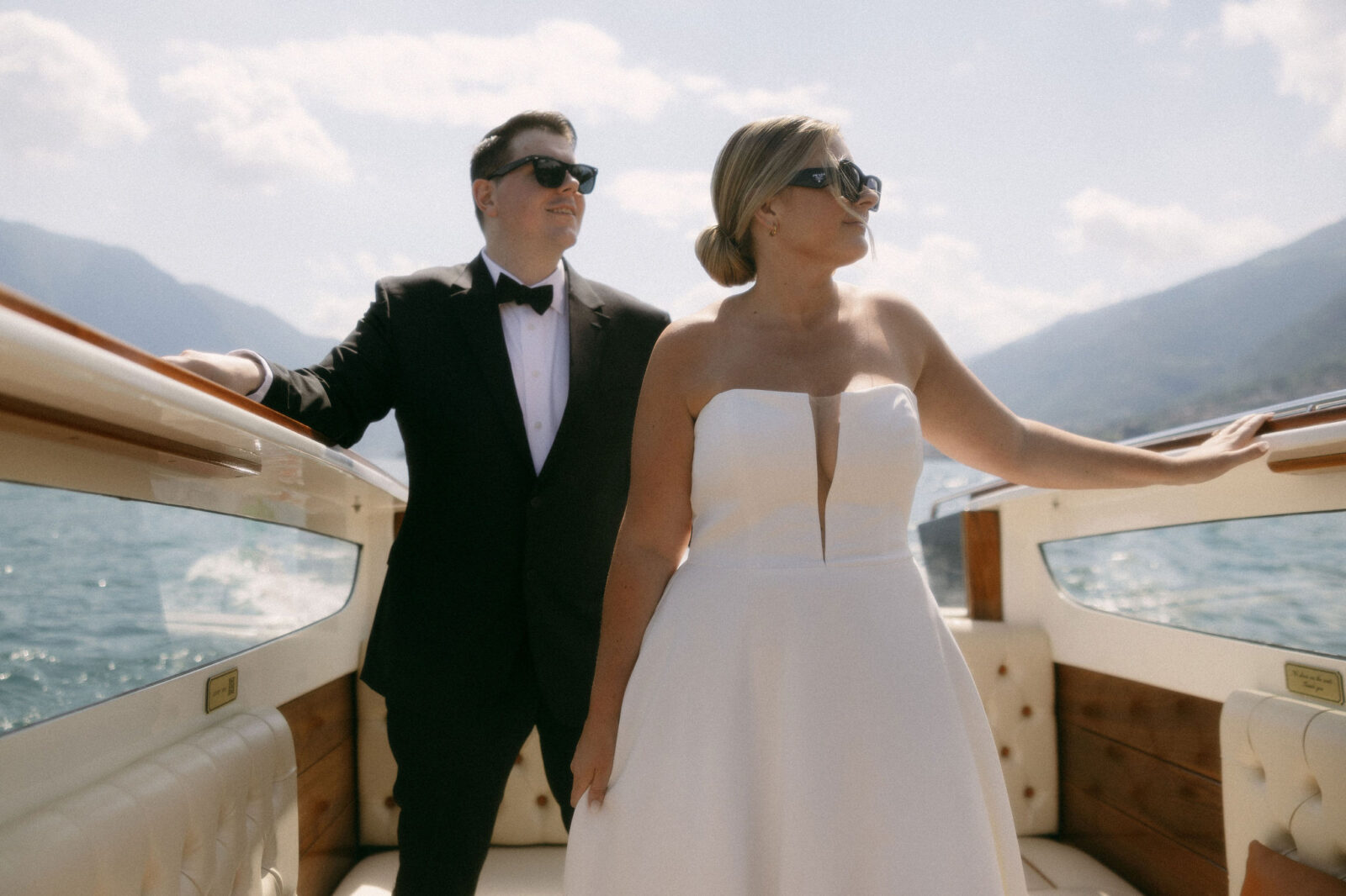 Editorial bride and groom portraits on a boat on Lake Como