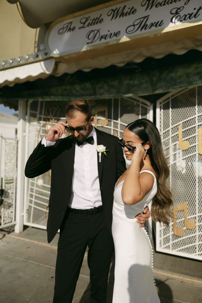 Bride and grooms Little White Chapel portraits with sunglasses