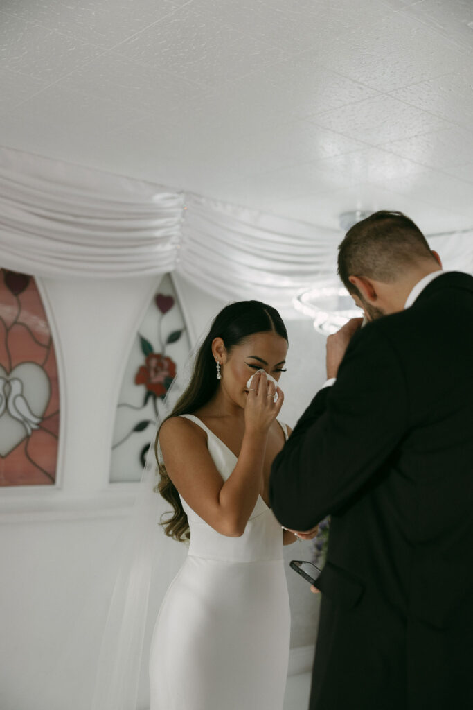 Bride and groom getting emotional during vow readings