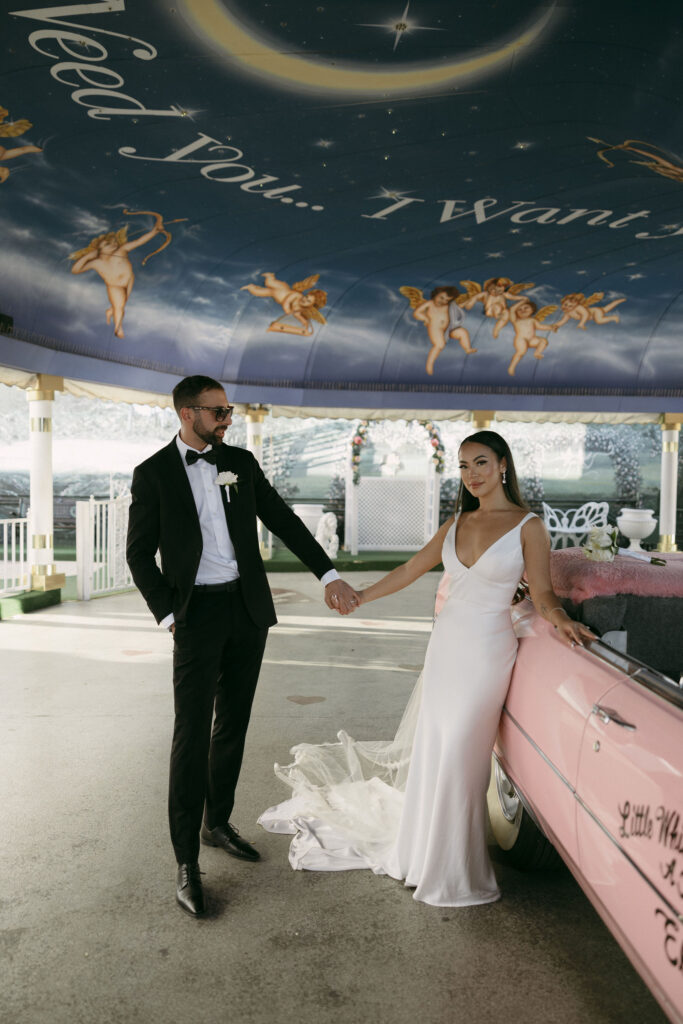 Editorial Las Vegas elopement portraits with The Pink Cadillac at Little White Chapel