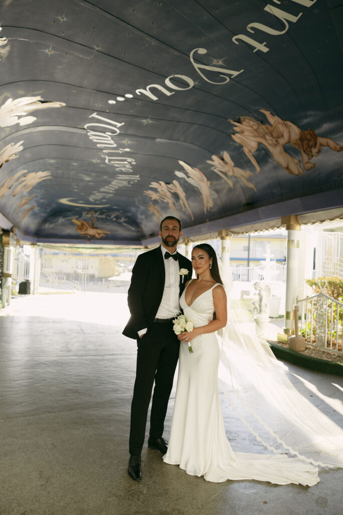 Bride and grooms portraits in The Tunnel of Love