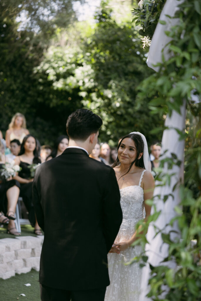 Bride looking at her groom during their Lakeside Weddings and Events wedding ceremony