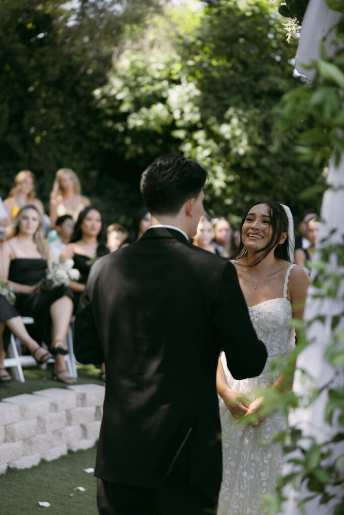 Bride looking at her groom during their Lakeside Weddings and Events Las Vegas wedding ceremony