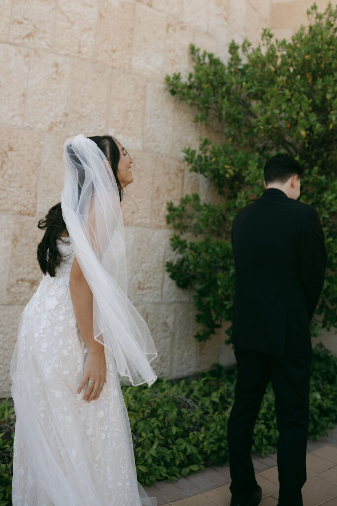 Bride and groom about to share their first looks