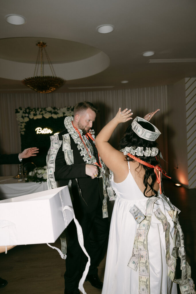 Bride and groom doing a money dance