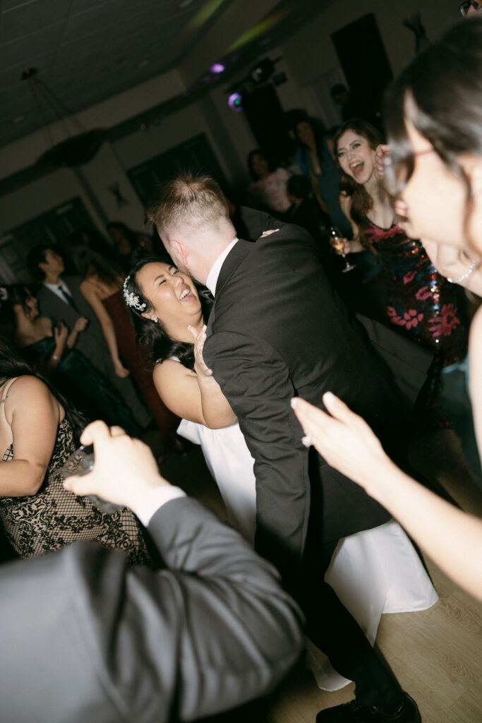 Bride and groom dancing during the reception