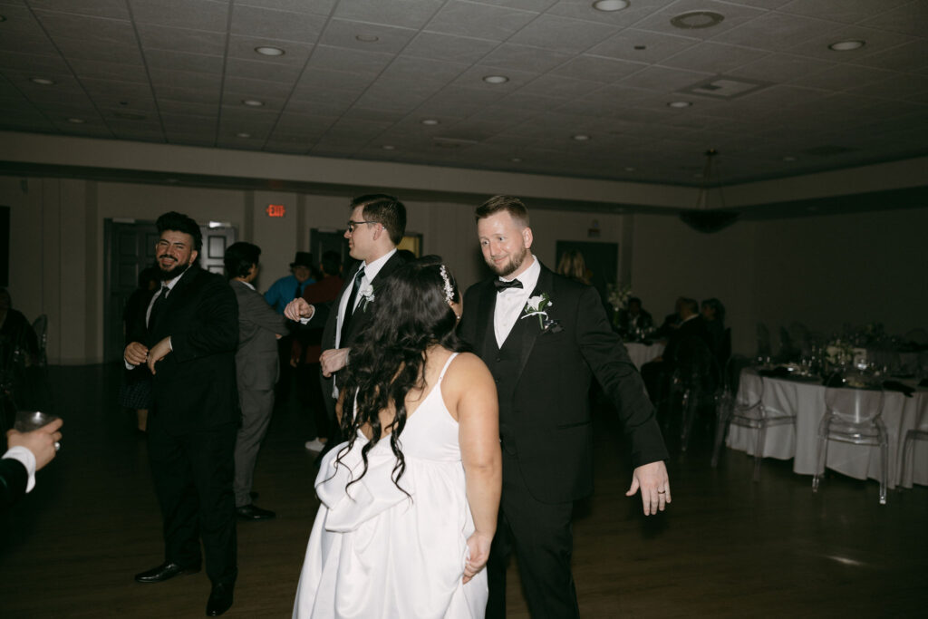 Bride and groom dancing during the reception