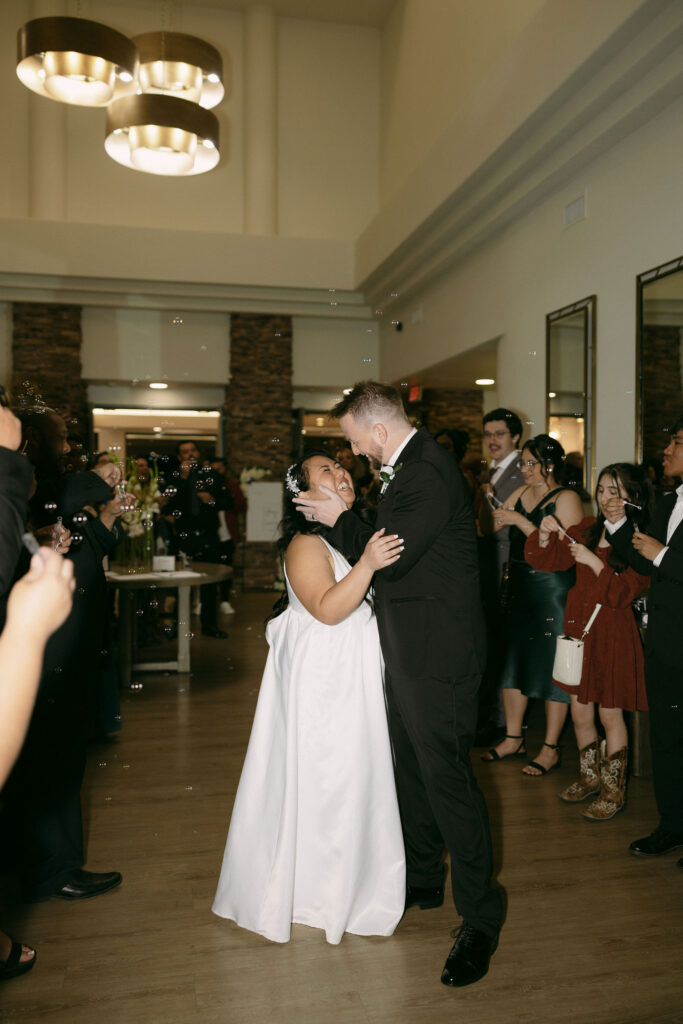 Bride and grooms bubble wedding exit