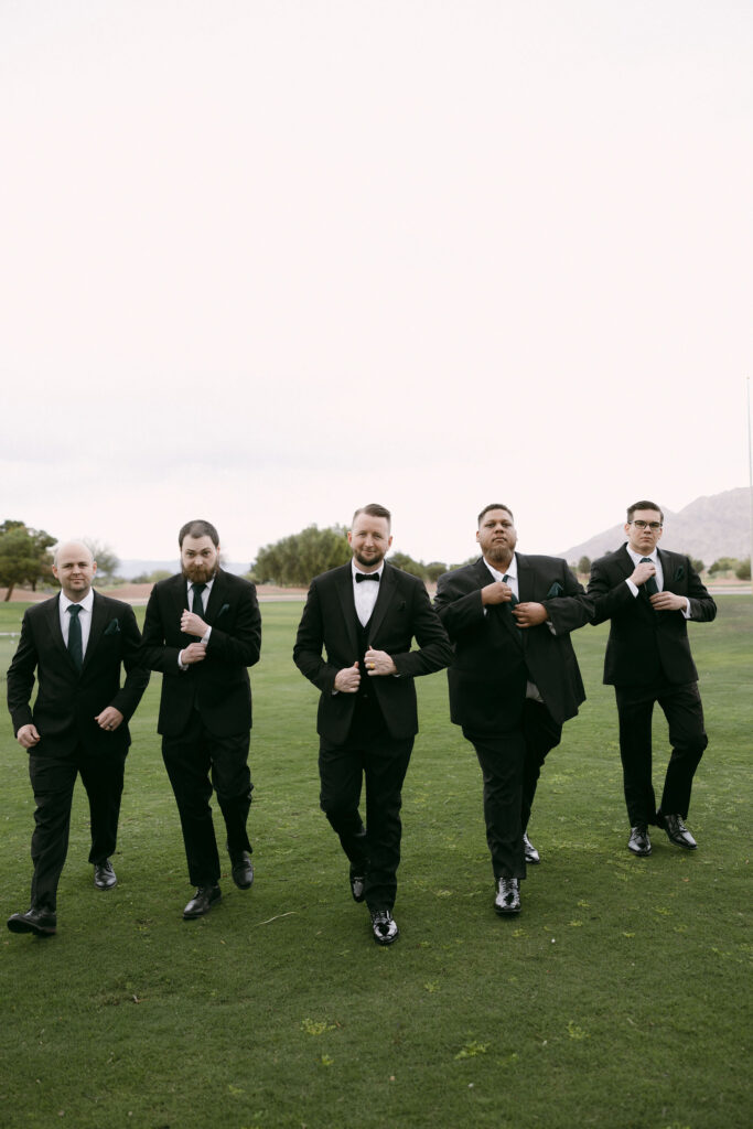 Outdoor groom and groomsmen portraits at Stallion Mountain wedding venue in Las Vegas