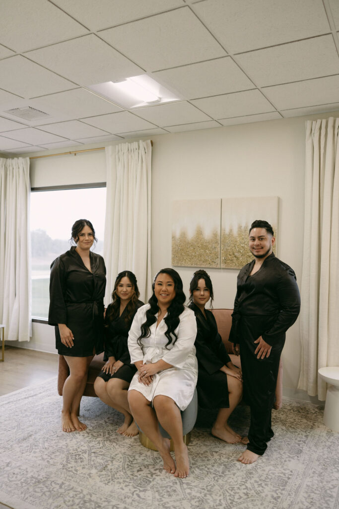 Bride and her wedding party getting ready