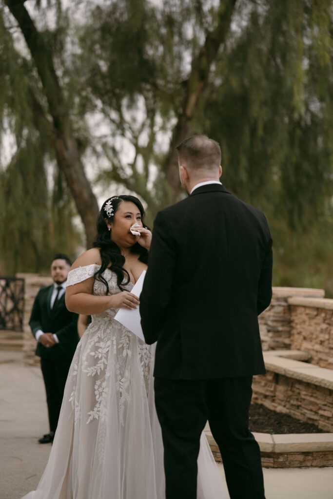 Bride getting emotional during vow readings