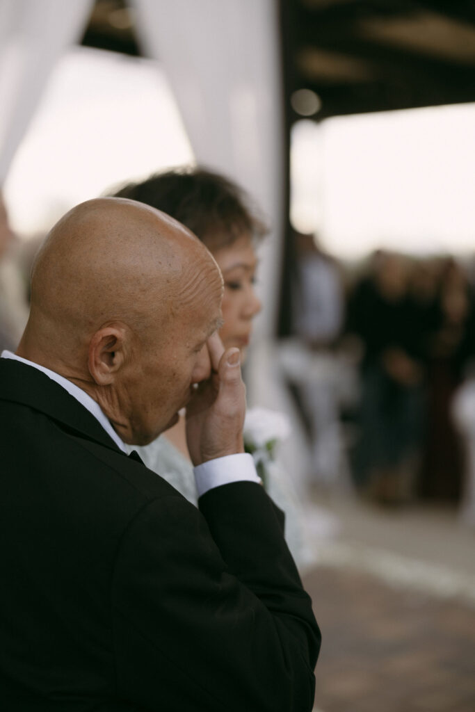 Brides parents getting emotional during the ceremony