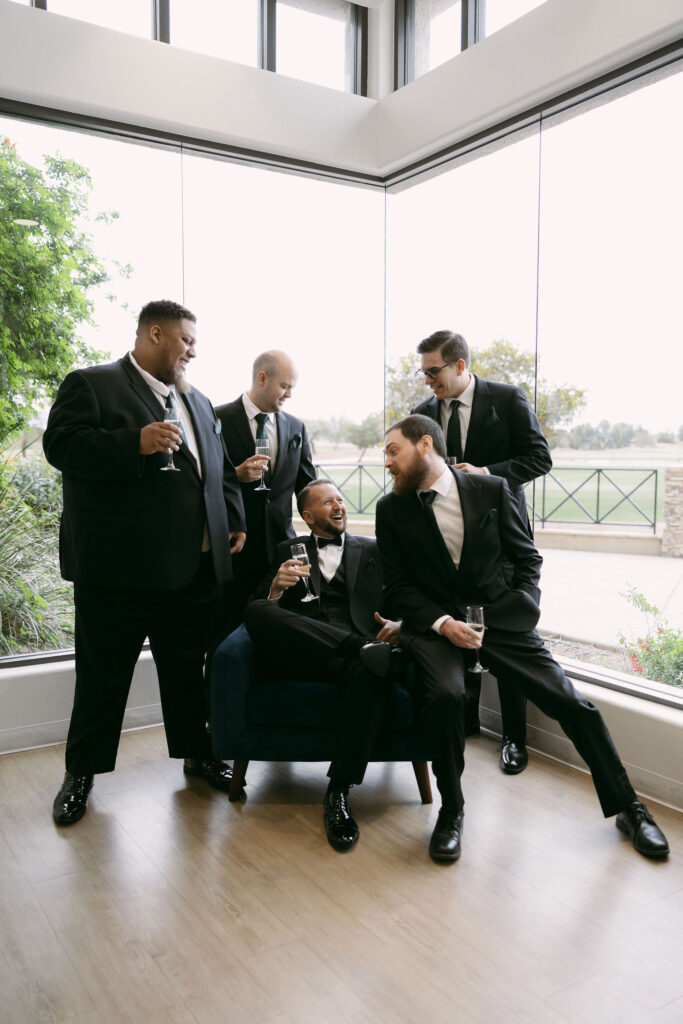 Indoor groom and groomsmen portraits at Stallion Mountain wedding venue in Las Vegas