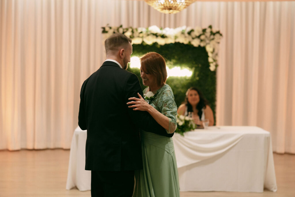 Groom dancing with his mother