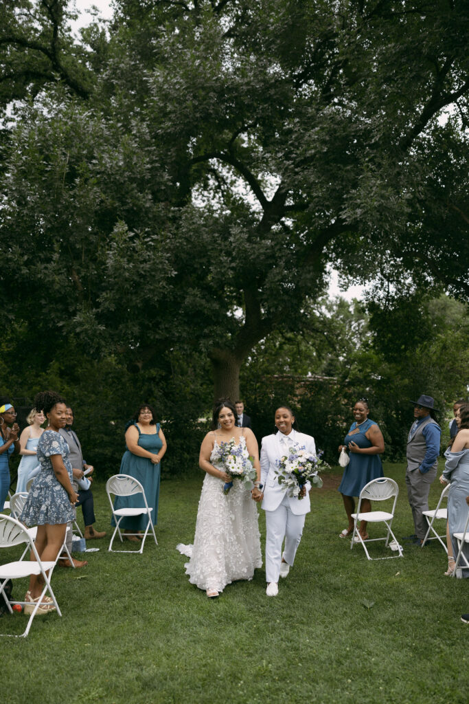 Couple walking back down the aisle after their Chautauqua Park, Boulder, CO wedding ceremony