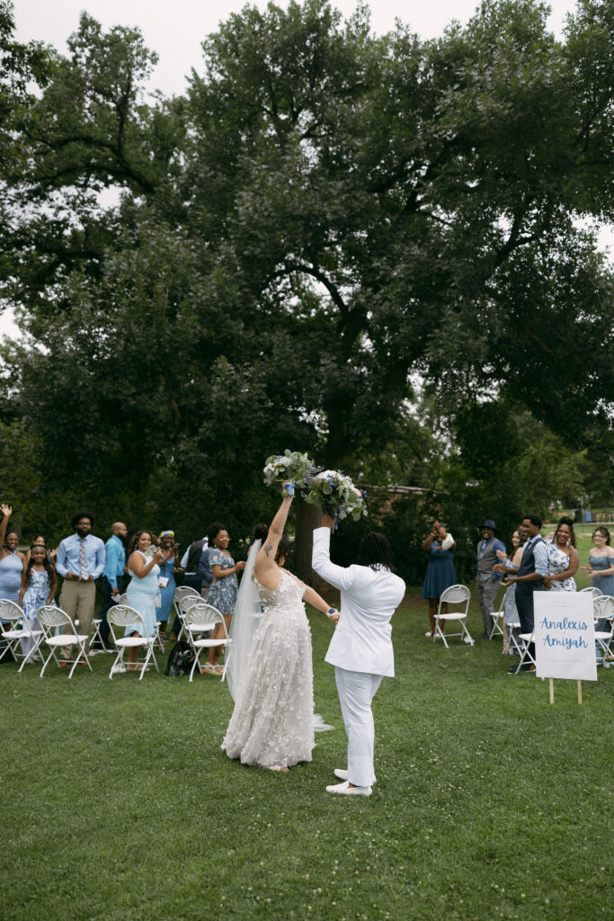 Couple walking back down the aisle after their Chautauqua Park, Boulder, CO wedding ceremony