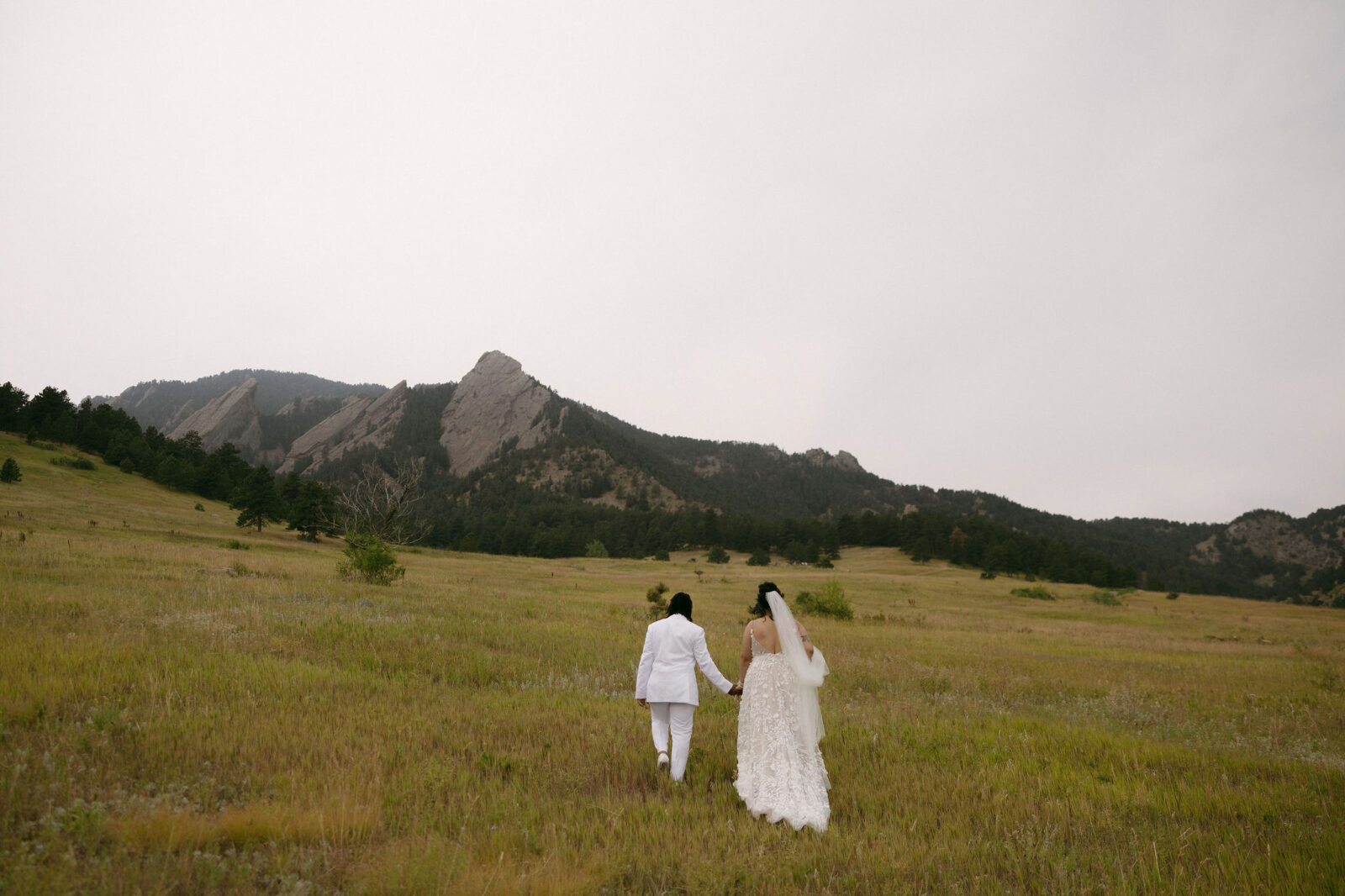 Couple posing for their Chautauqua Park wedding portraits in Boulder, Colorado