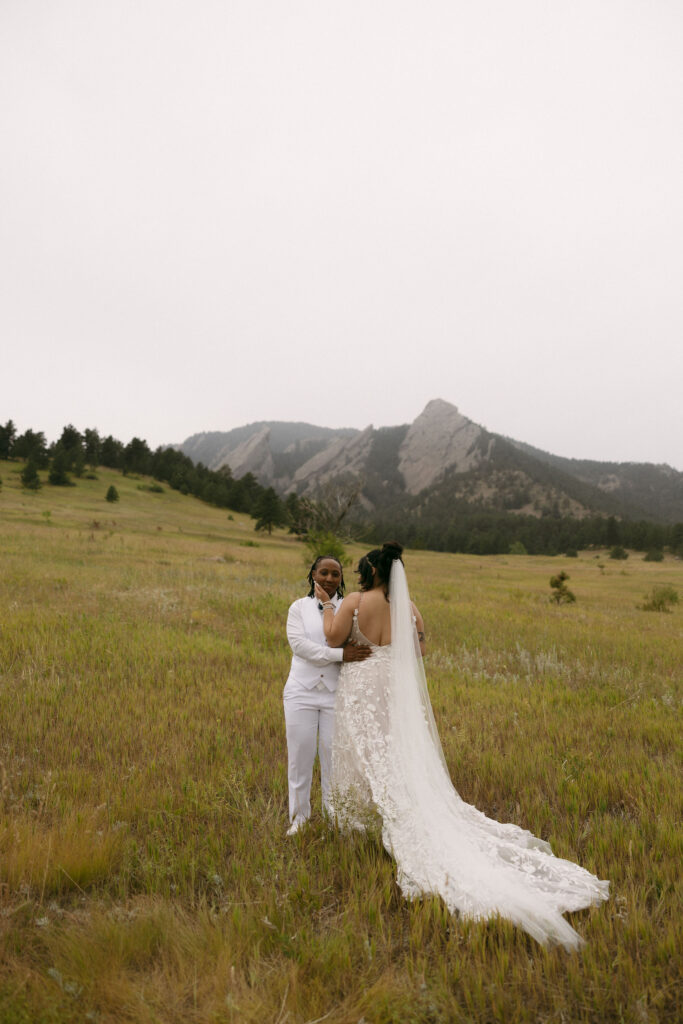 Couple posing during their Chautauqua Park wedding portraits