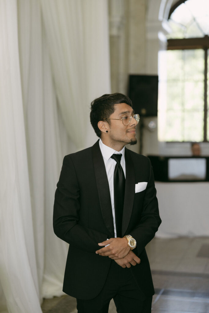 Groom getting emotional seeing his bride walking down the aisle