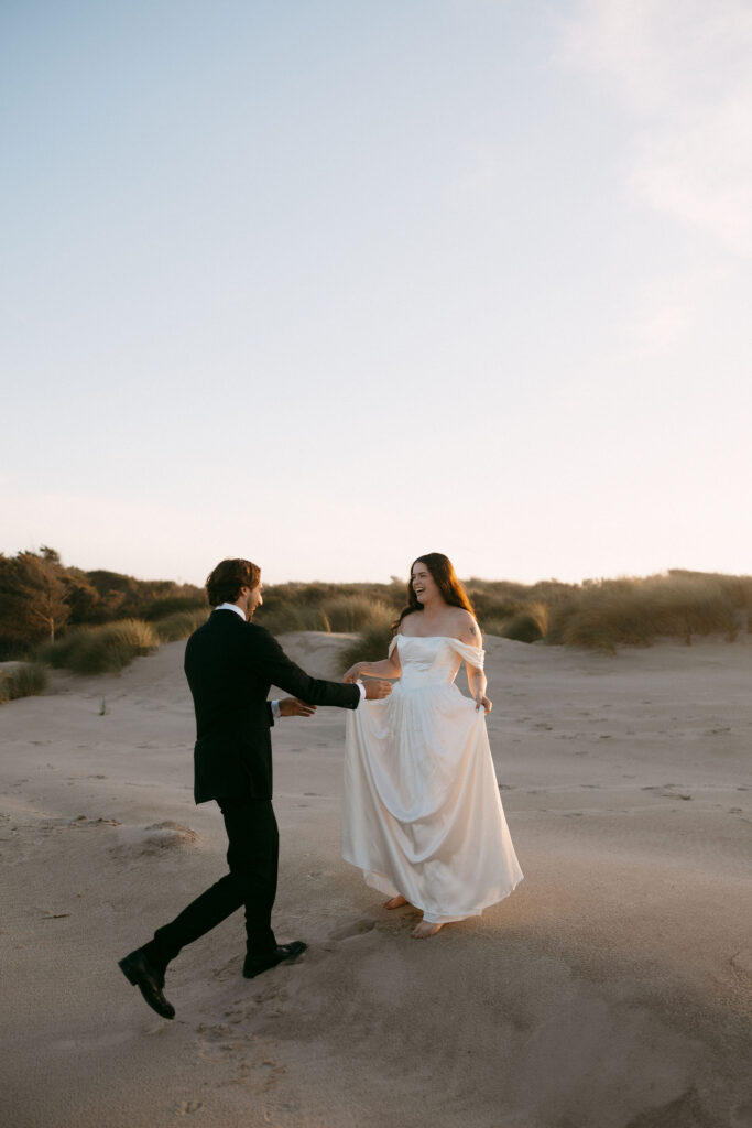 Bride and groom being playful during their Northern Oregon Coast elopement