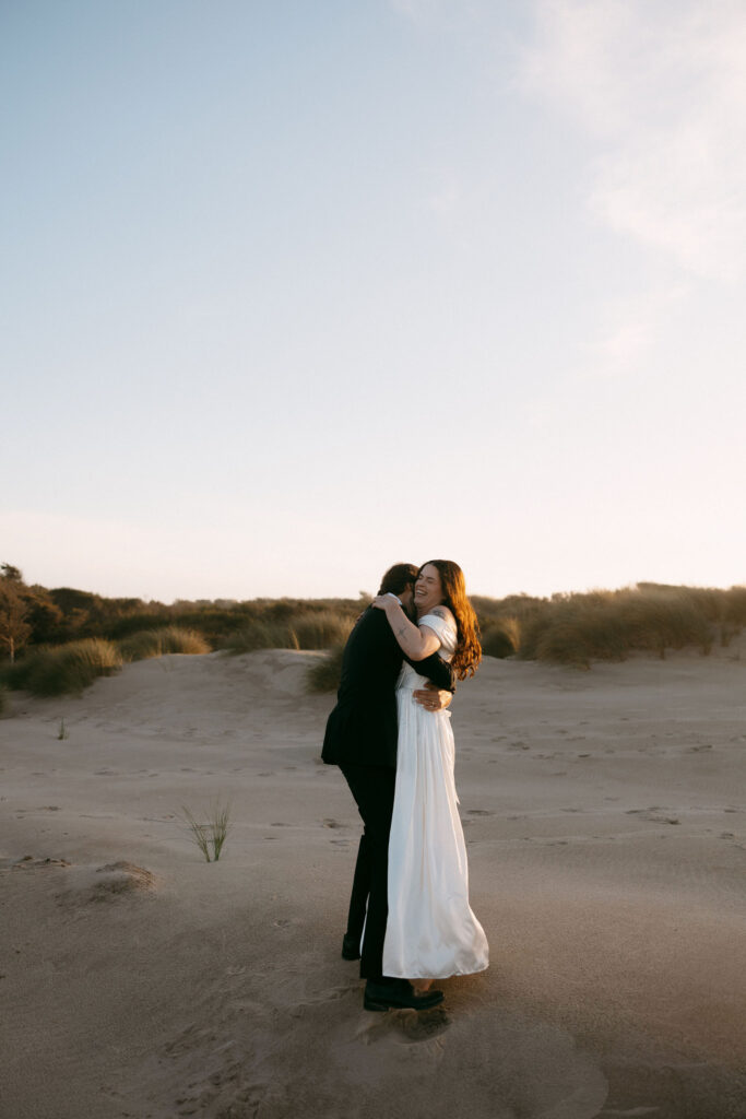 Couple hugging on the beach