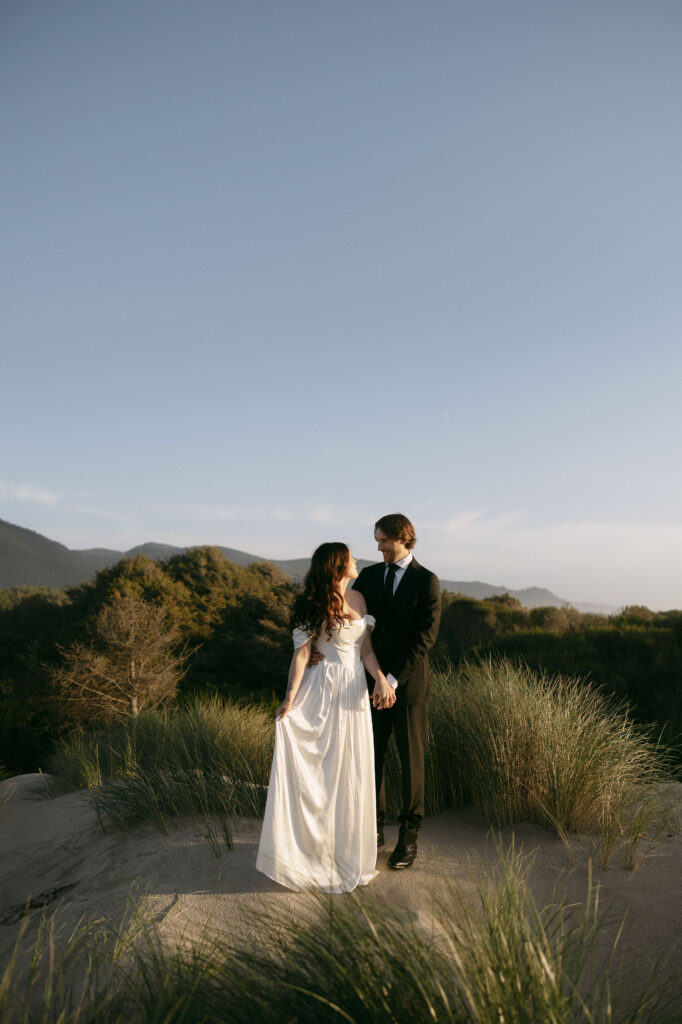 Bride and groom posing during their Northern Oregon Coast elopement