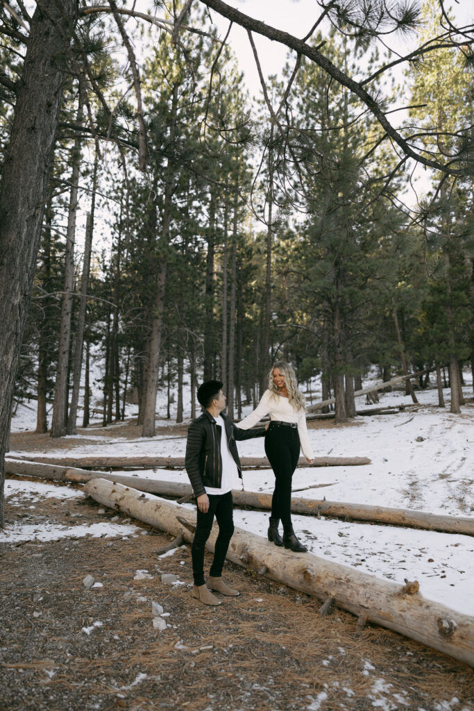 Man and woman posing for their Mt. Charleston photoshoot