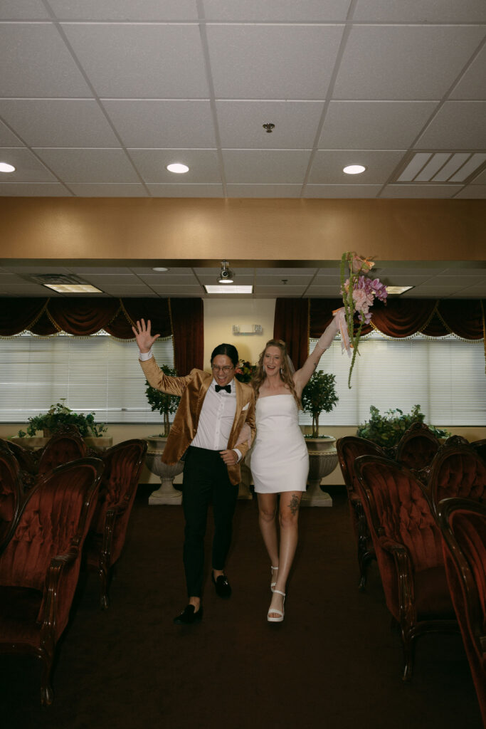 Bride and groom walking down the aisle after their Chapel Amore wedding ceremony