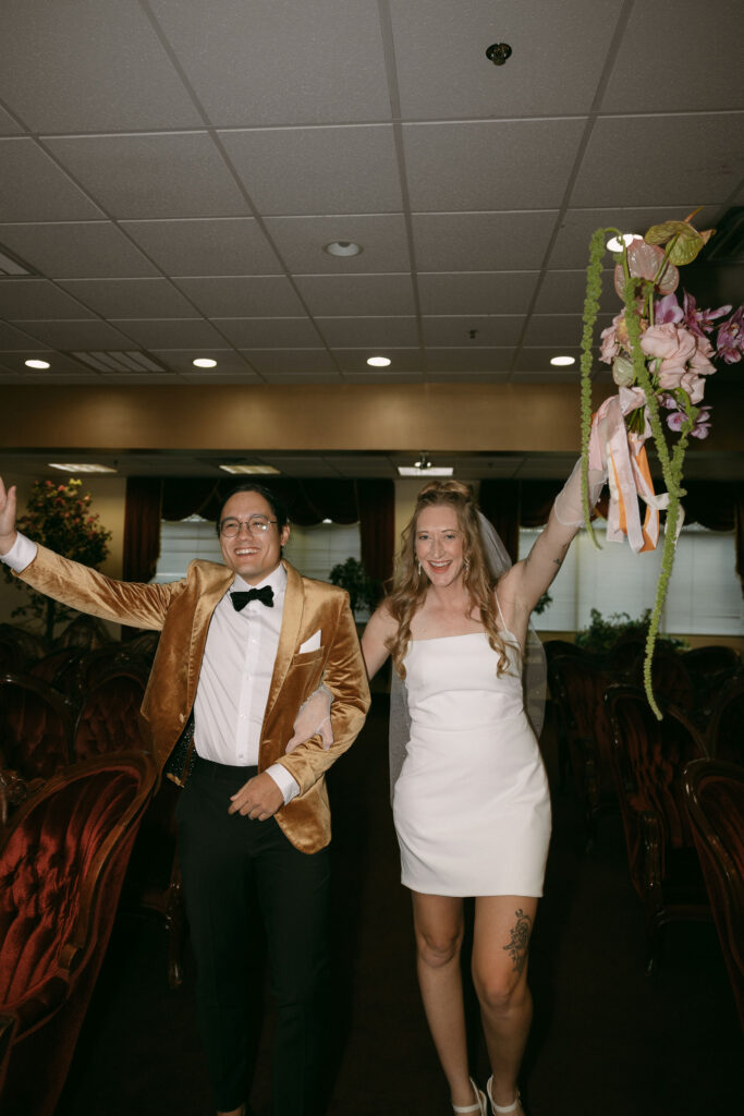 Bride and groom walking down the aisle after their Chapel Amore wedding ceremony
