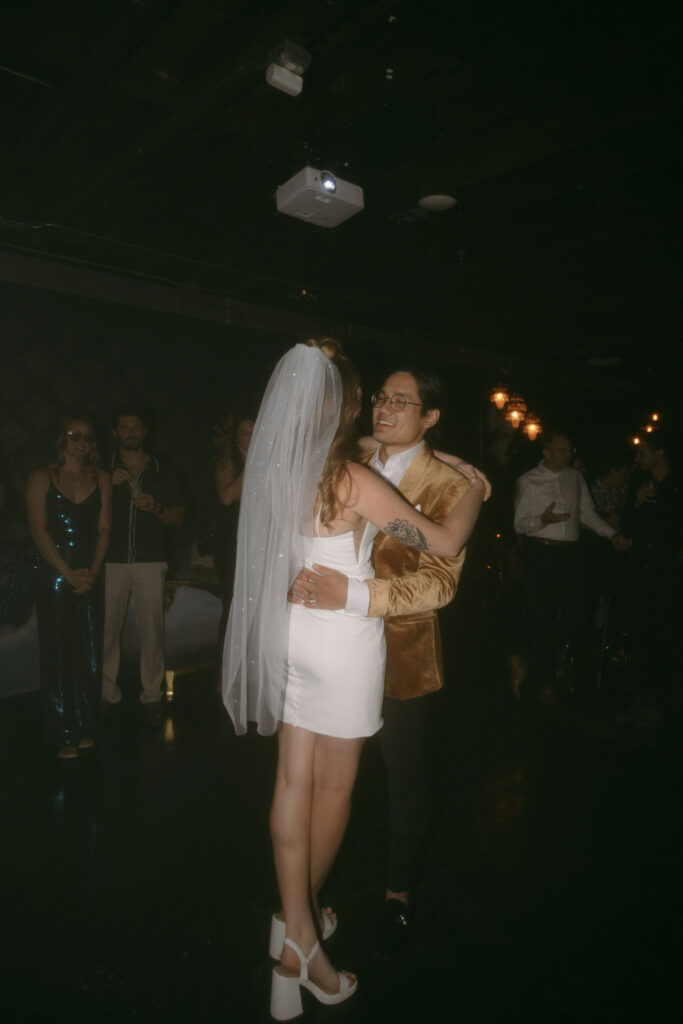 Bride and groom dancing during their intimate Velveteen Rabbit wedding reception