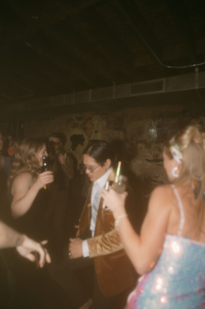 Groom dancing during his Velveteen Rabbit wedding reception