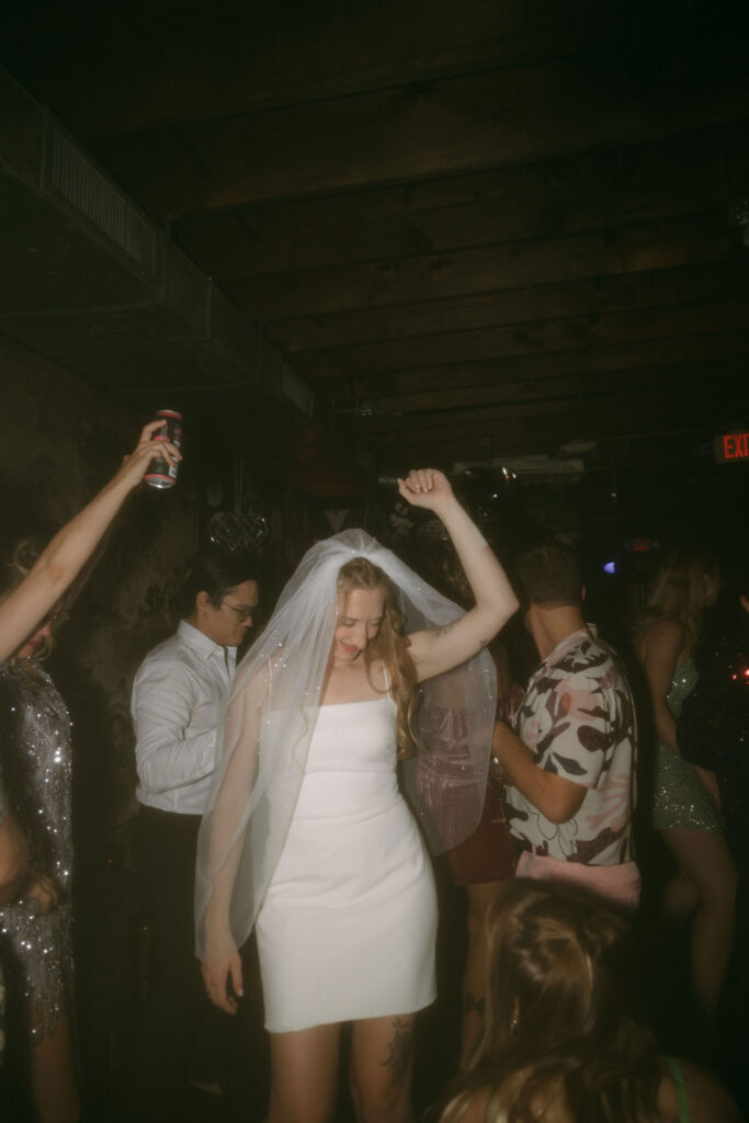 Bride and groom dancing during their Velveteen Rabbit wedding reception