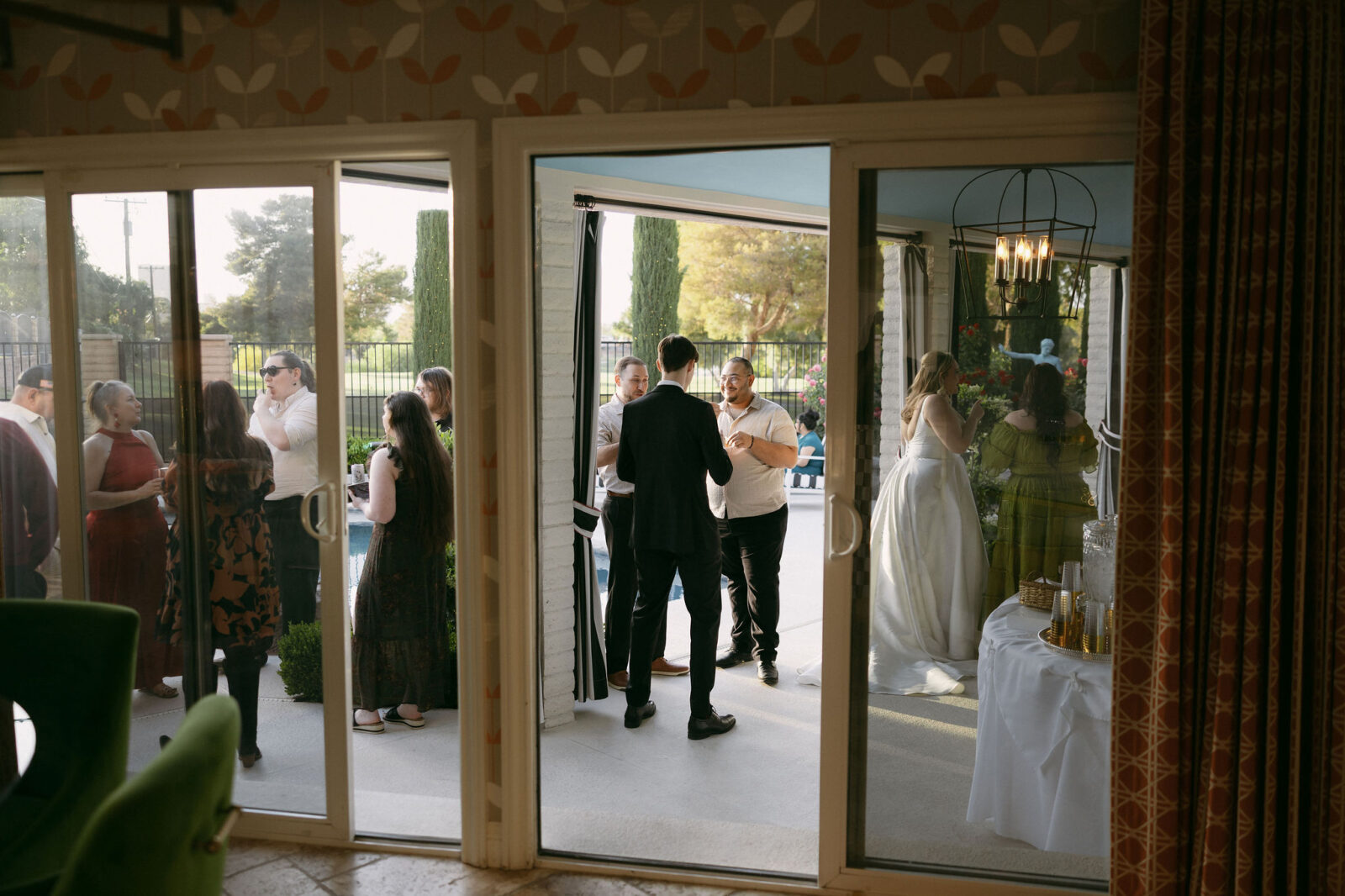 Bride and groom mingling during cocktail hour