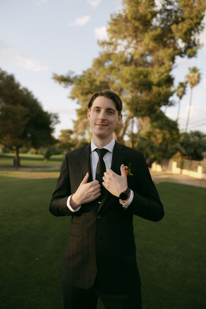 Outdoor grooms portraits at Midcentury Manor in Las Vegas