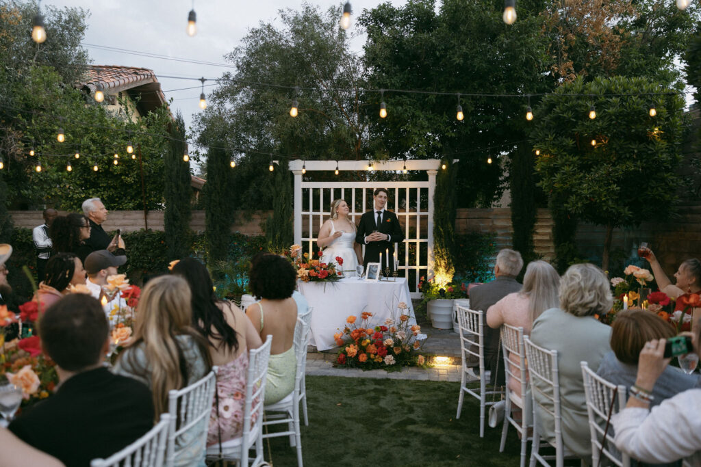 Bride and groom giving speeches