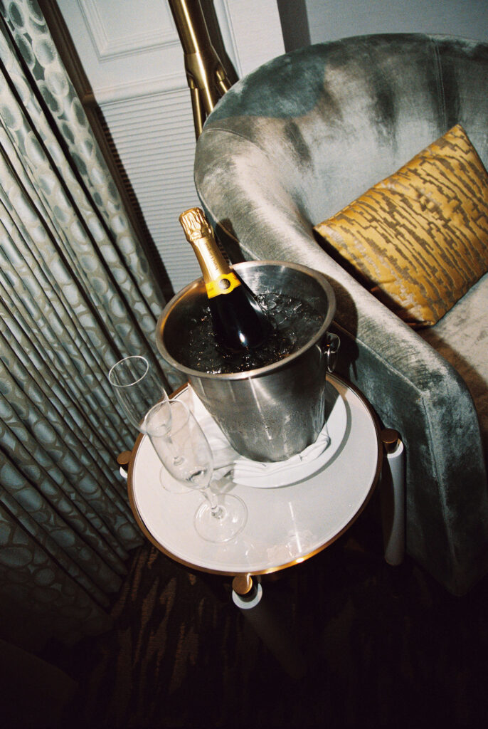 Two glasses and a bottle of champagne
