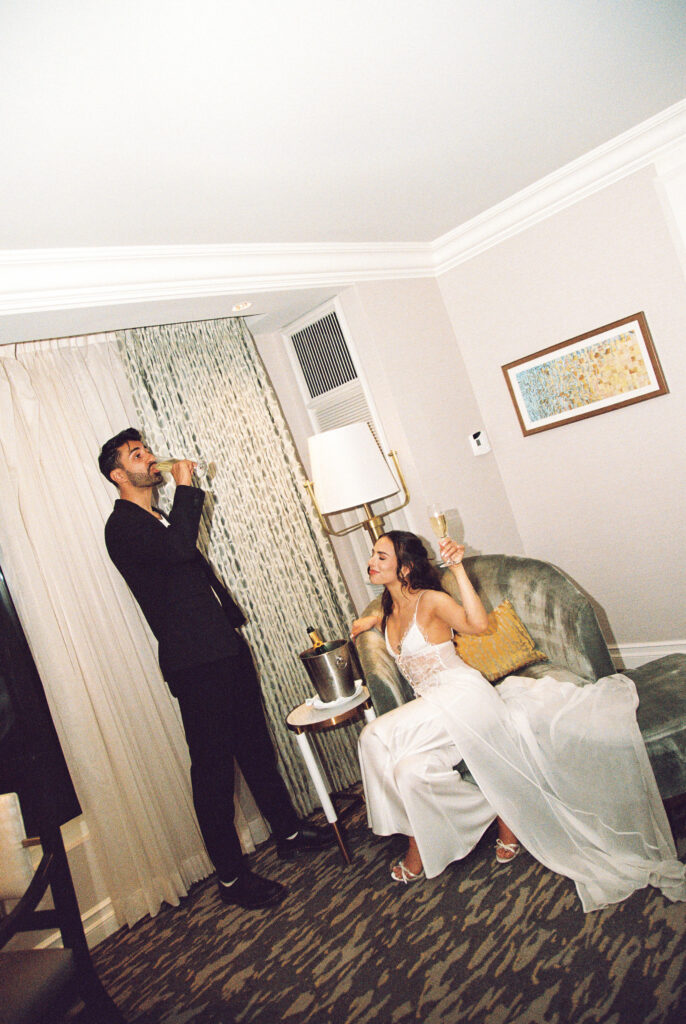 Couple pouring glasses of champagne