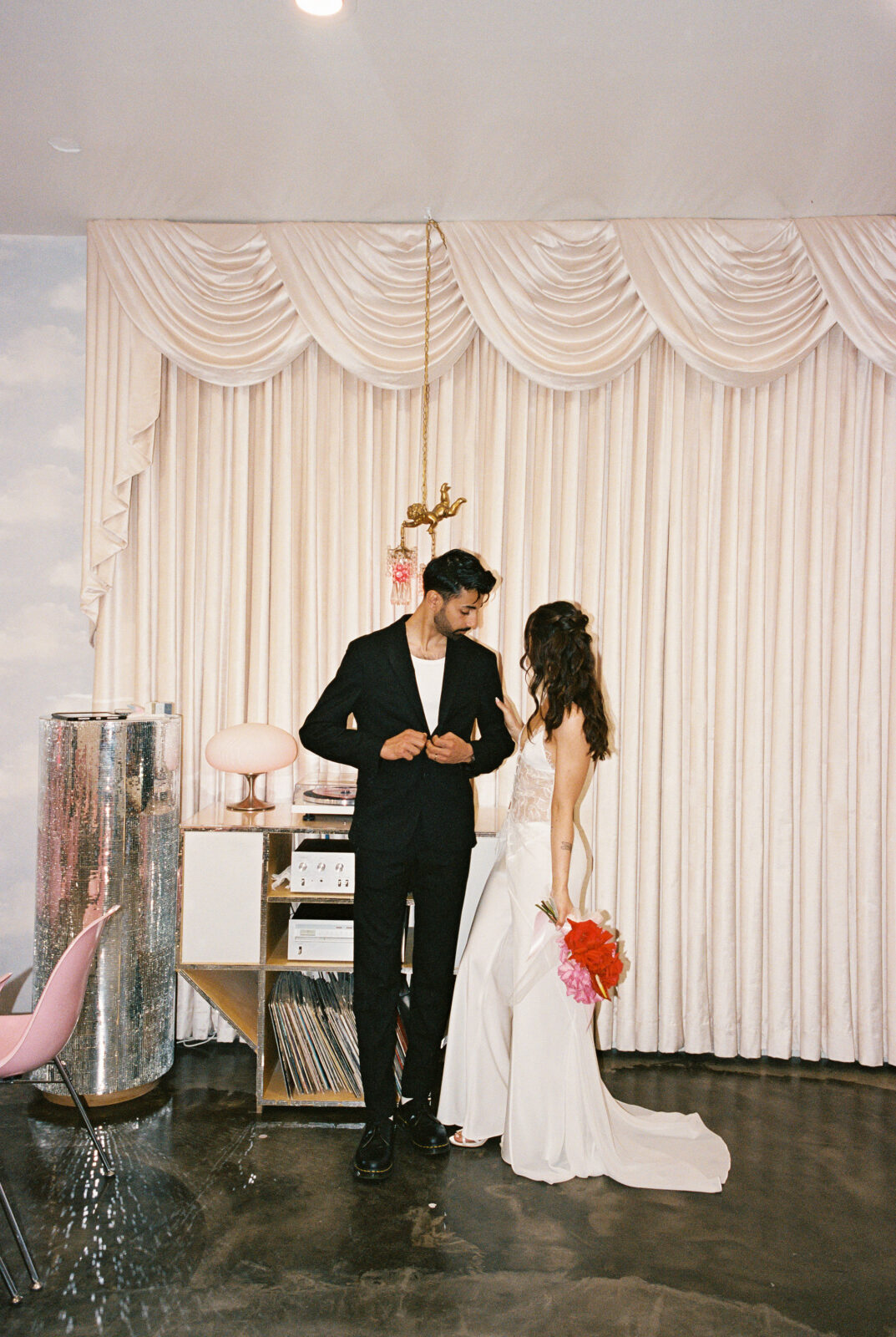 Bride and groom posing at Sure Thing Chapel