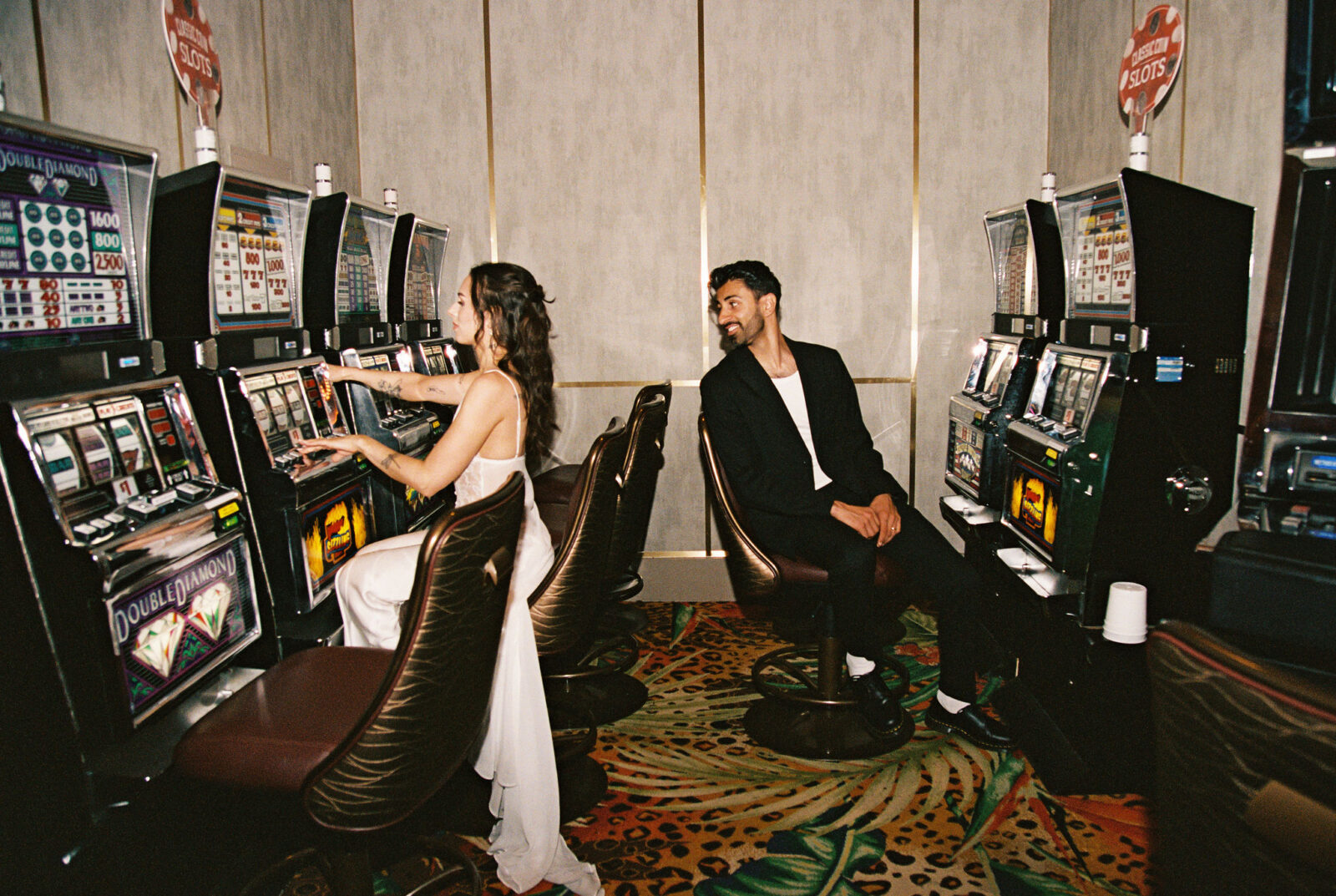Couple playing the slots at a Las Vegas casino