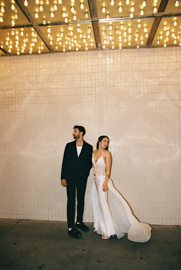 Couple posing under the plaza lights in Las Vegas