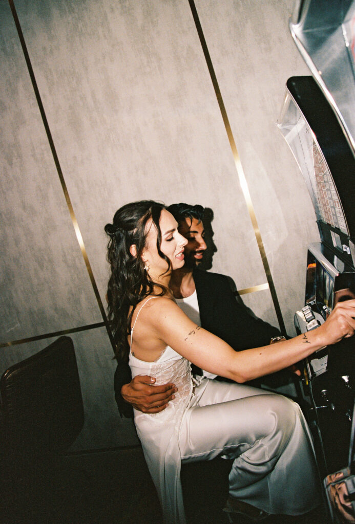 Couple playing the slots