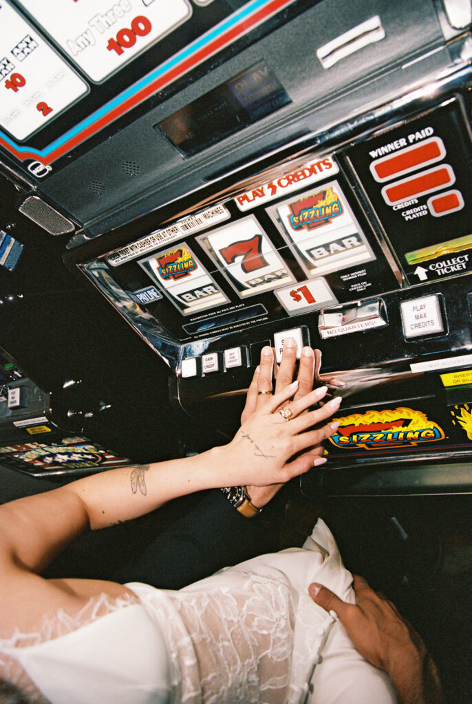 Couple playing the slots in Las Vegas