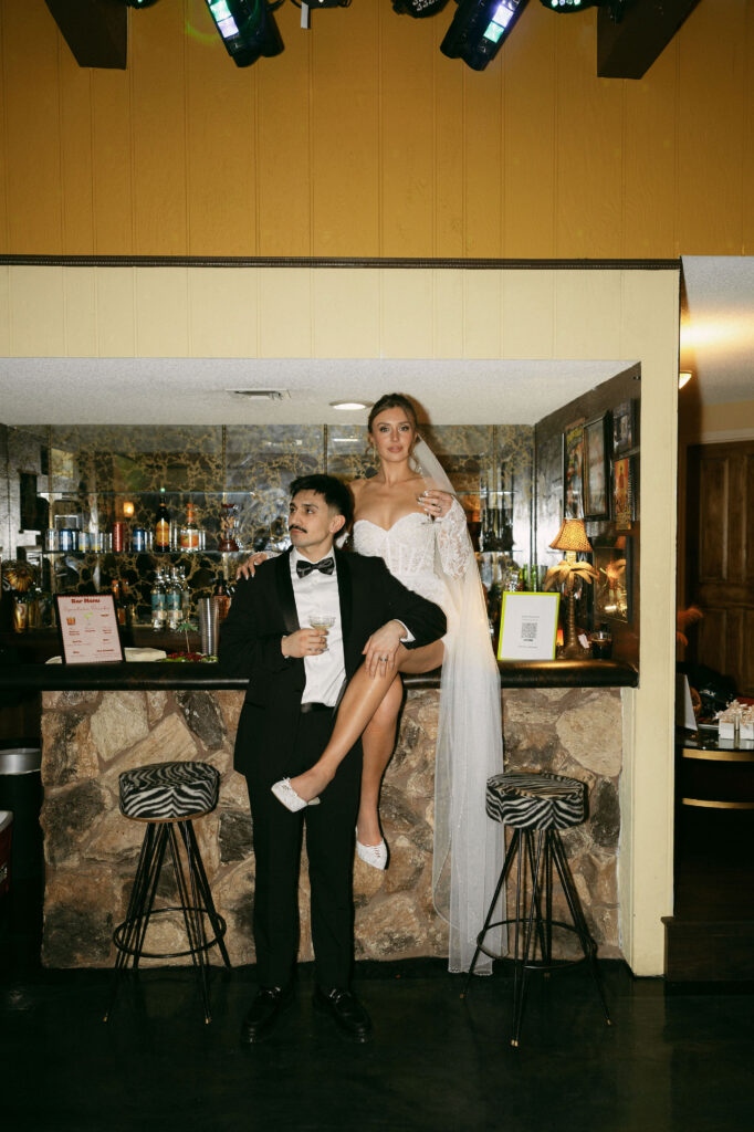 Editorial retro Las Vegas elopement photos at a indoor home bar