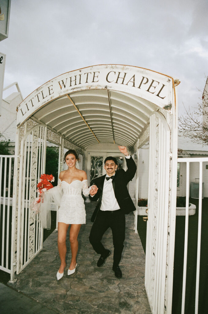 Bride and groom exiting The Little White Chapel in Las Vegas