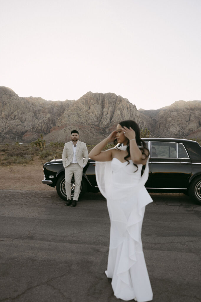 Couples editorial Red Rock Canyon engagement photos in Las Vegas with classic Rolls Royce