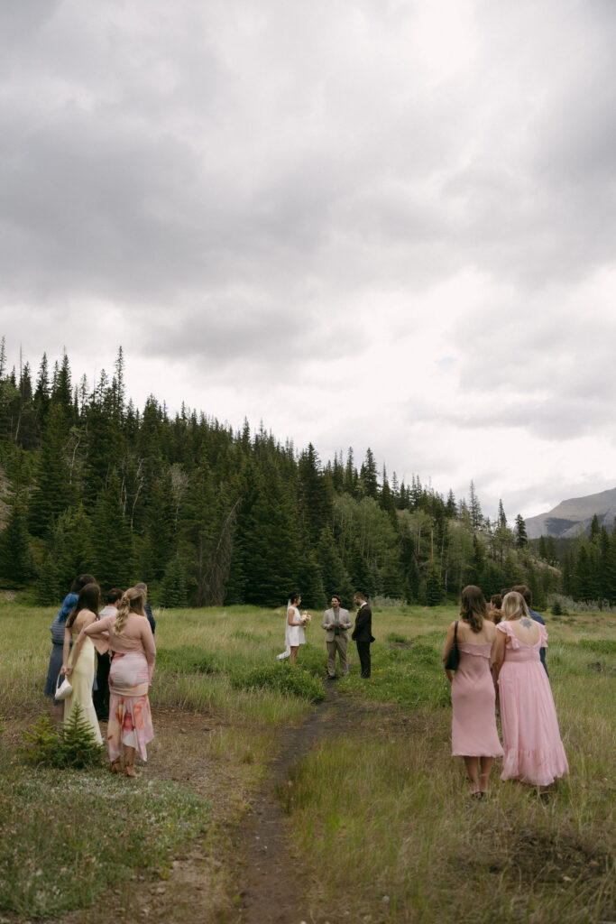 An intimate Banff National Park elopement ceremony at Mount Norquay Lookout.
