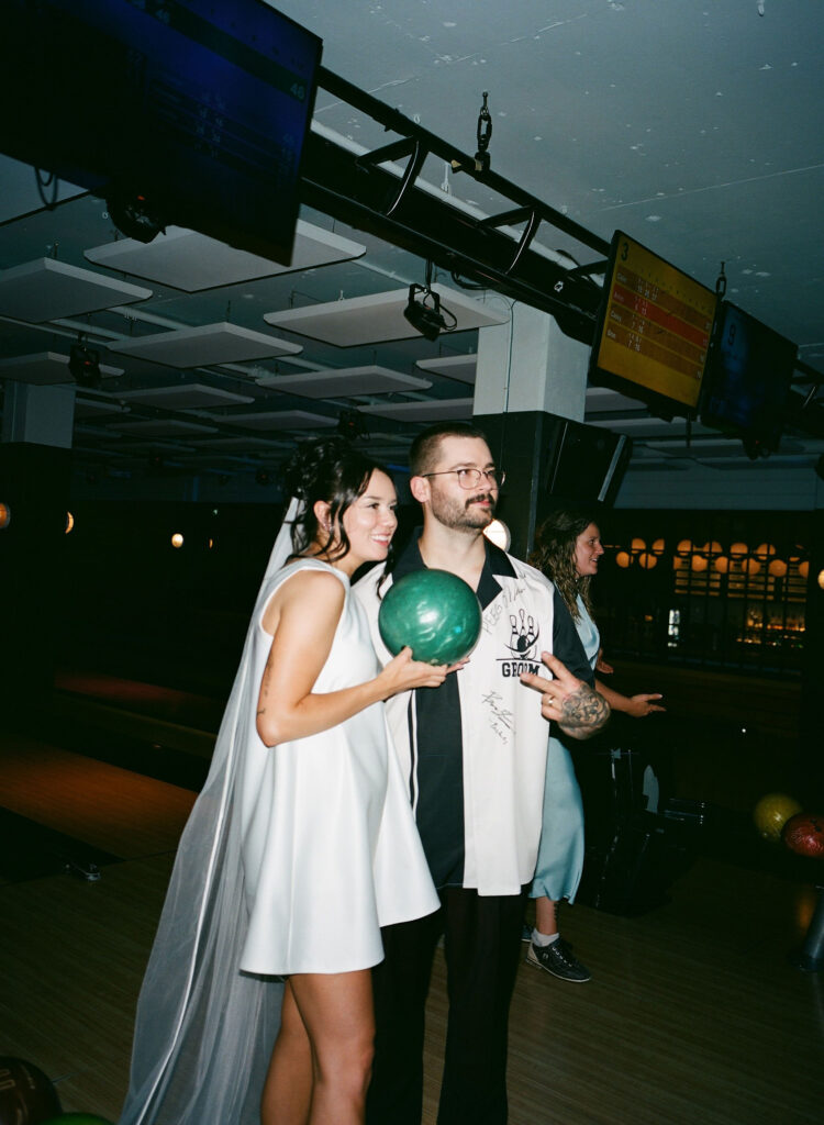 Bride and groom bowling captured on film