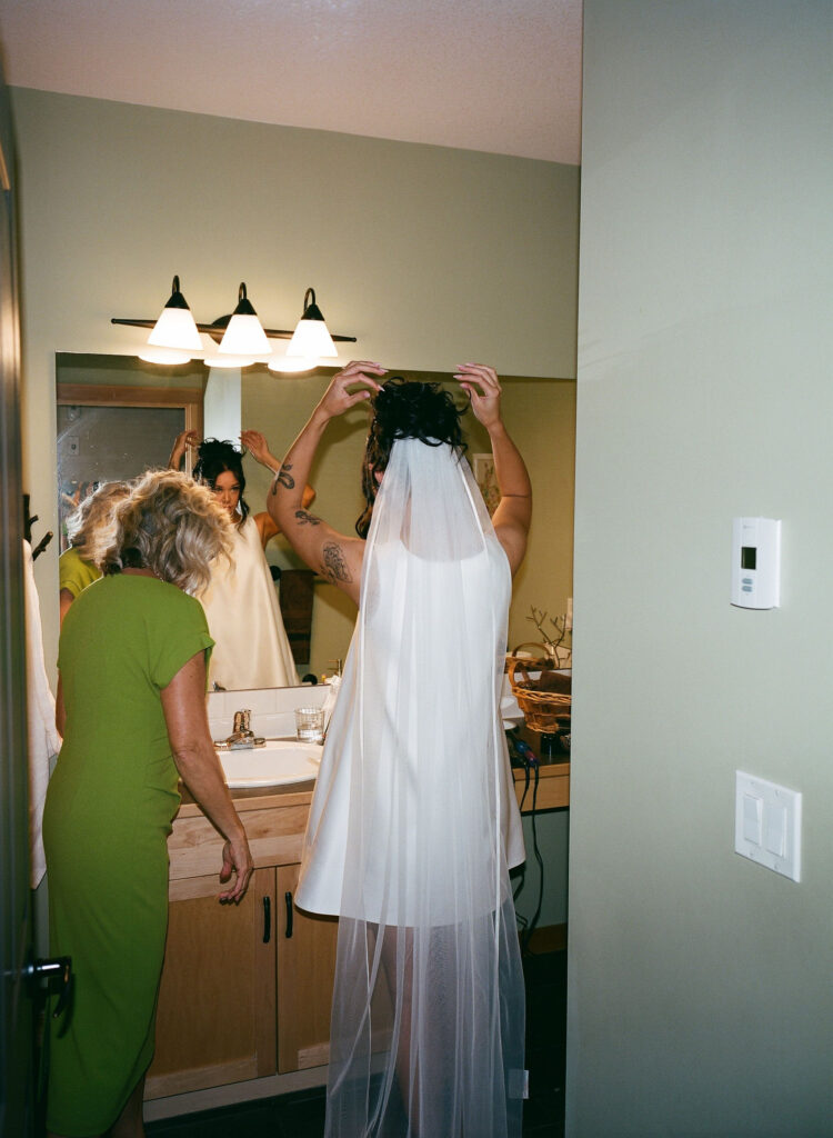 Bride getting ready for her elopement on film
